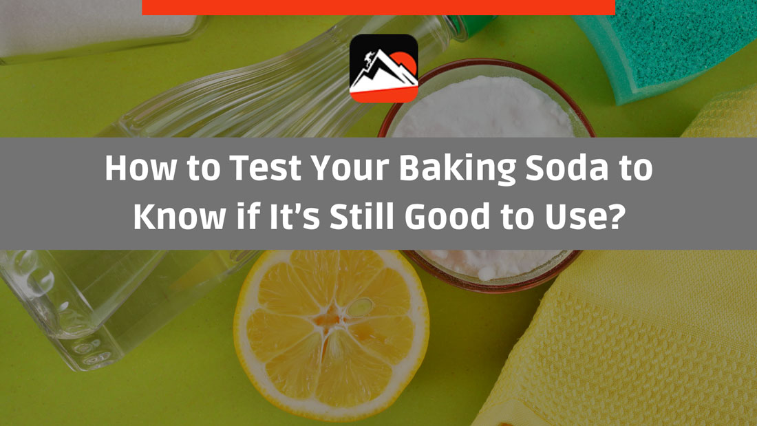 baking soda with a bottle of vinegar and a lemon